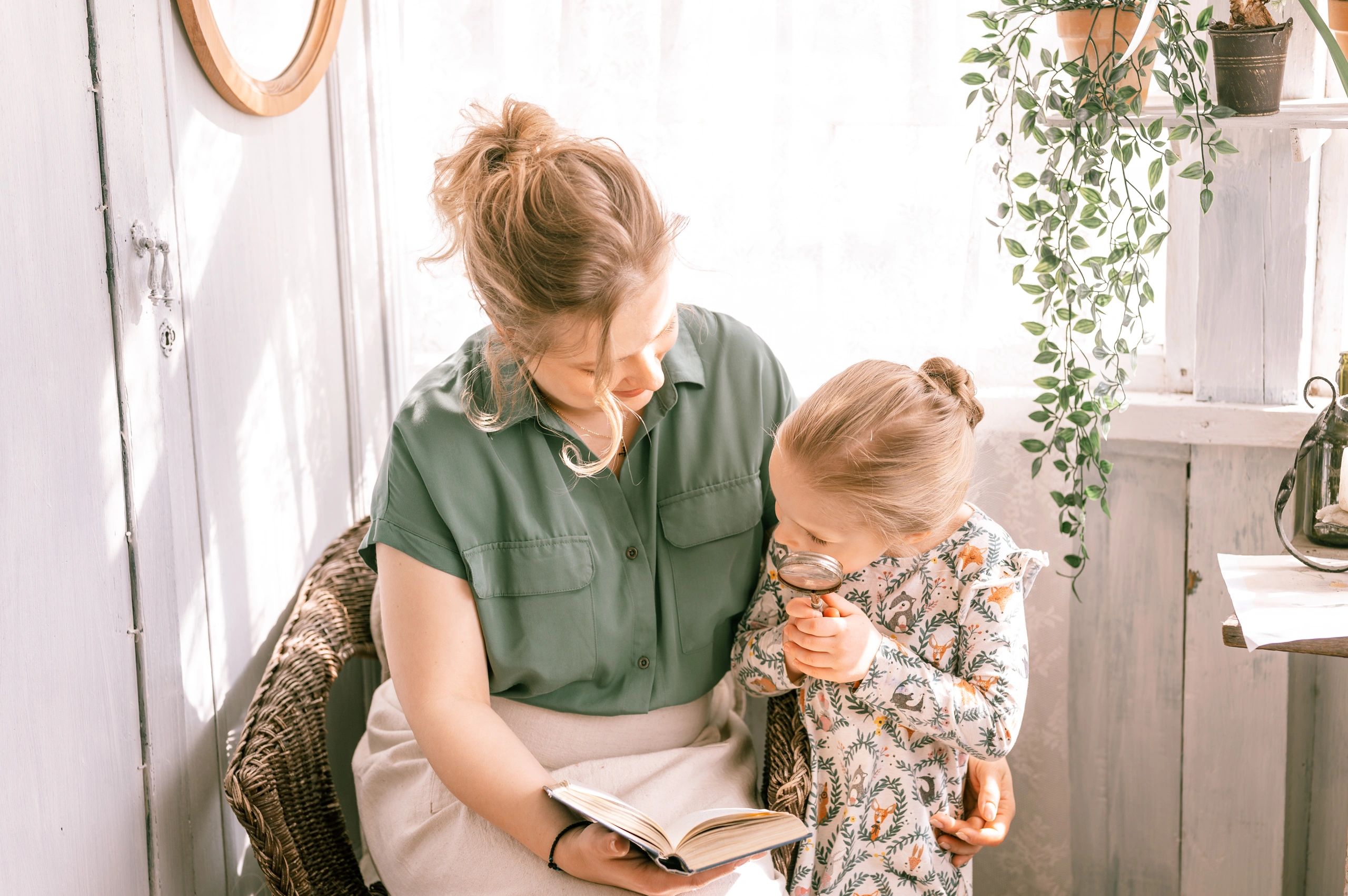 Mother and daughter reading together at home