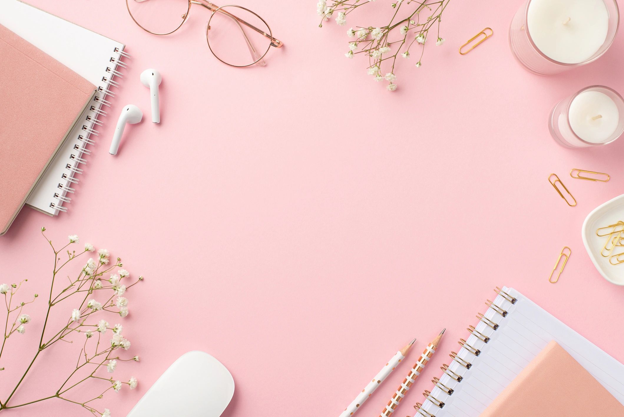 Pastel pink workspace flat lay with stationery