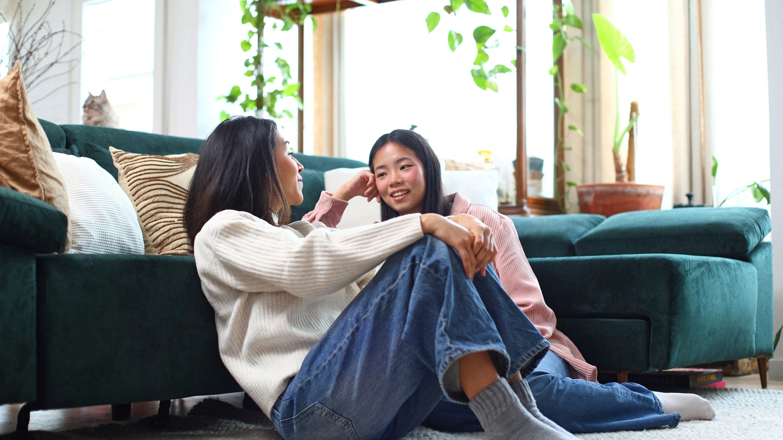 Mother and daughter sharing a joyful moment at home