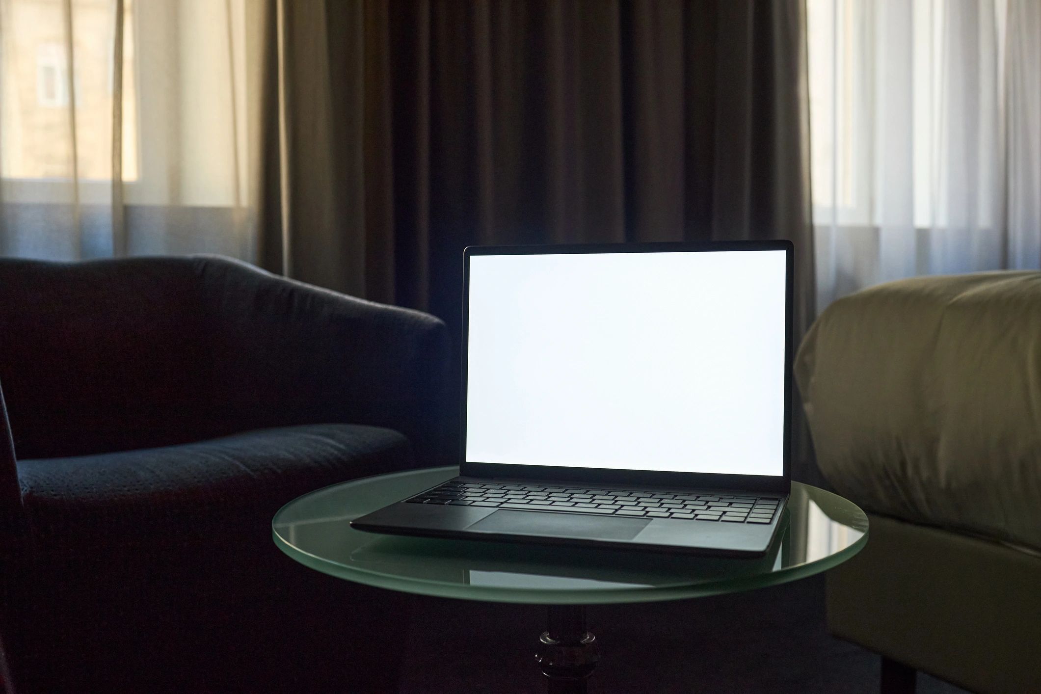Feminine home office workspace with laptop for digital planning